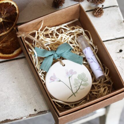 Medaglia in ceramica e profumo